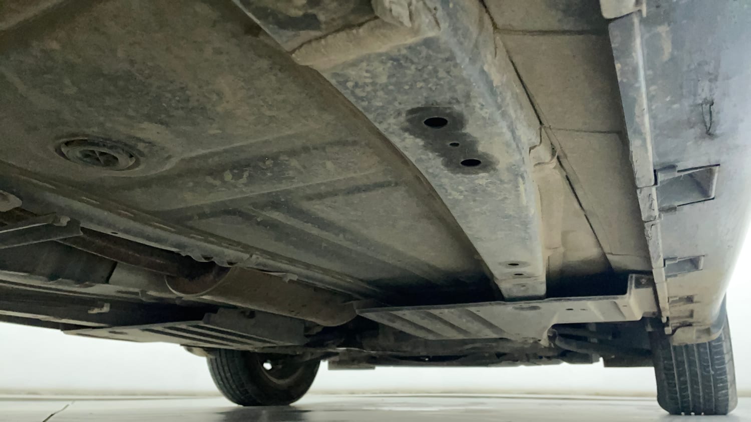 Used 2024 Maruti Suzuki Baleno Sigma MT Petrol Manual extra REAR RIGHT UNDERBODY VIEW