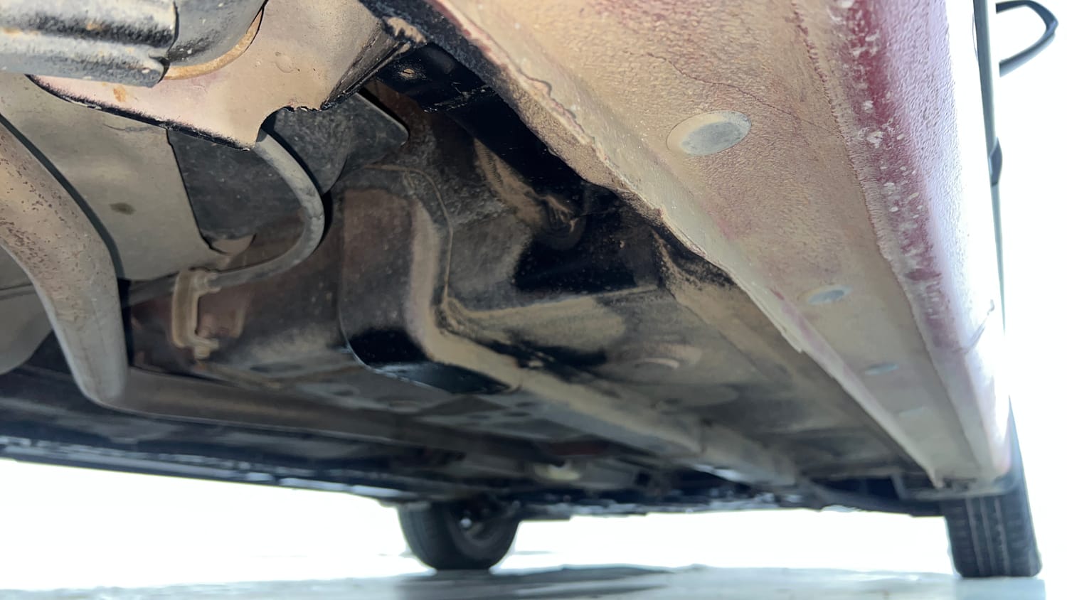 Used 2018 Hyundai Grand i10 Sportz (O) AT 1.2 Kappa VTVT Petrol Automatic extra REAR RIGHT UNDERBODY VIEW