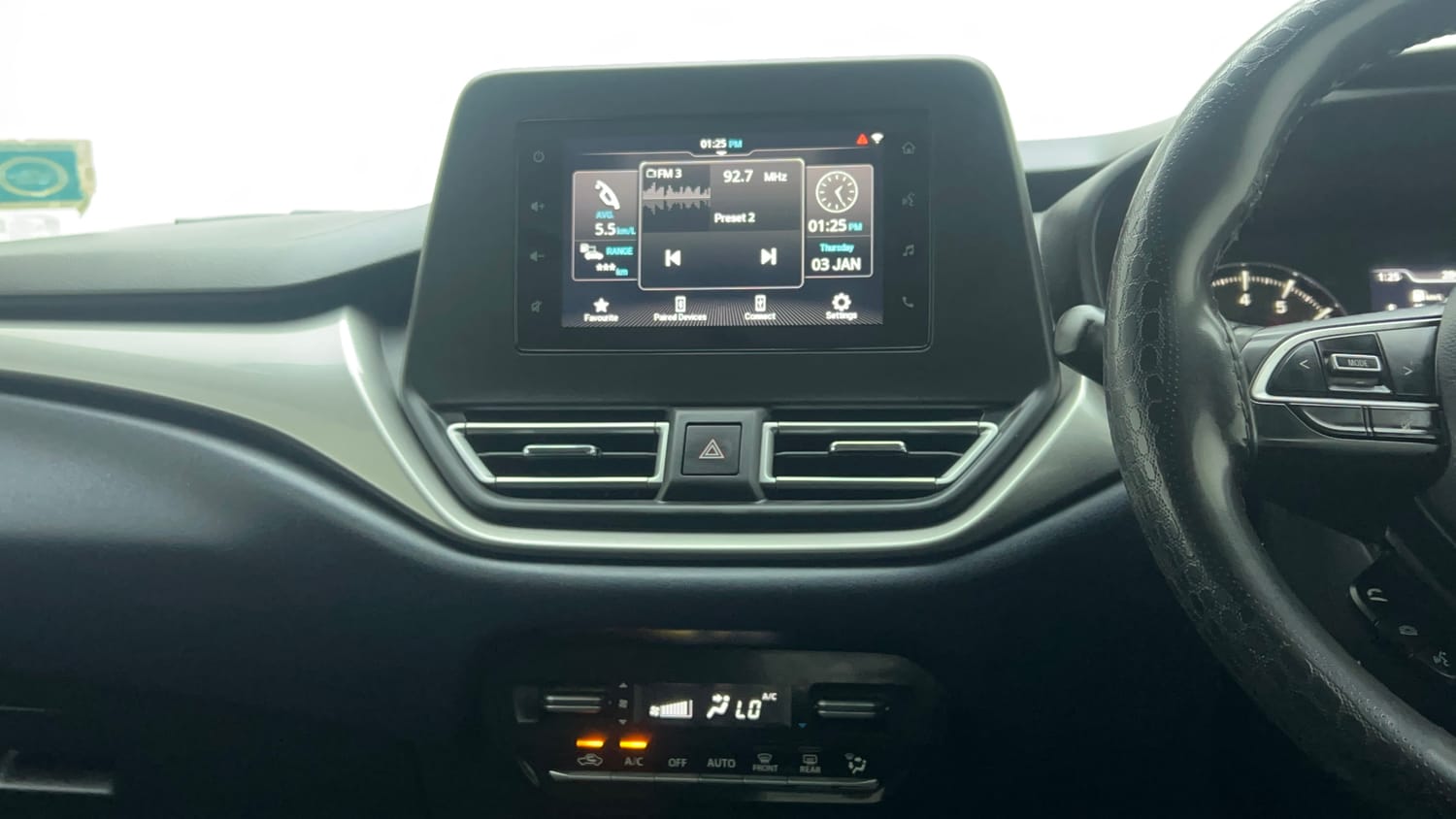 Used 2022 Maruti Suzuki Baleno Zeta MT Petrol Manual top_features Integrated (in-dash) music system