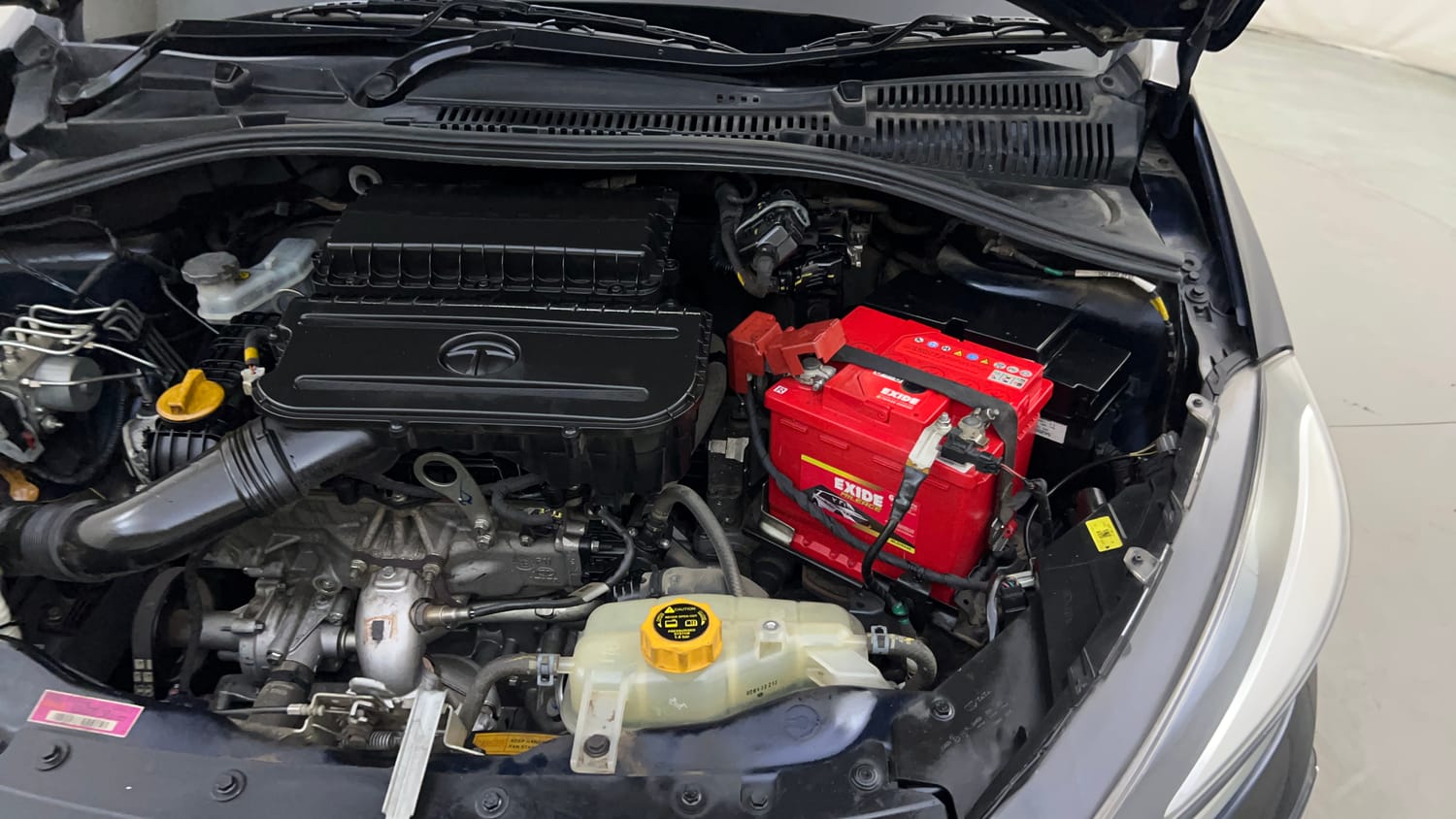 Used 2022 Tata Tigor XZA Plus Petrol Automatic engine ENGINE LEFT SIDE HINGE & APRON VIEW