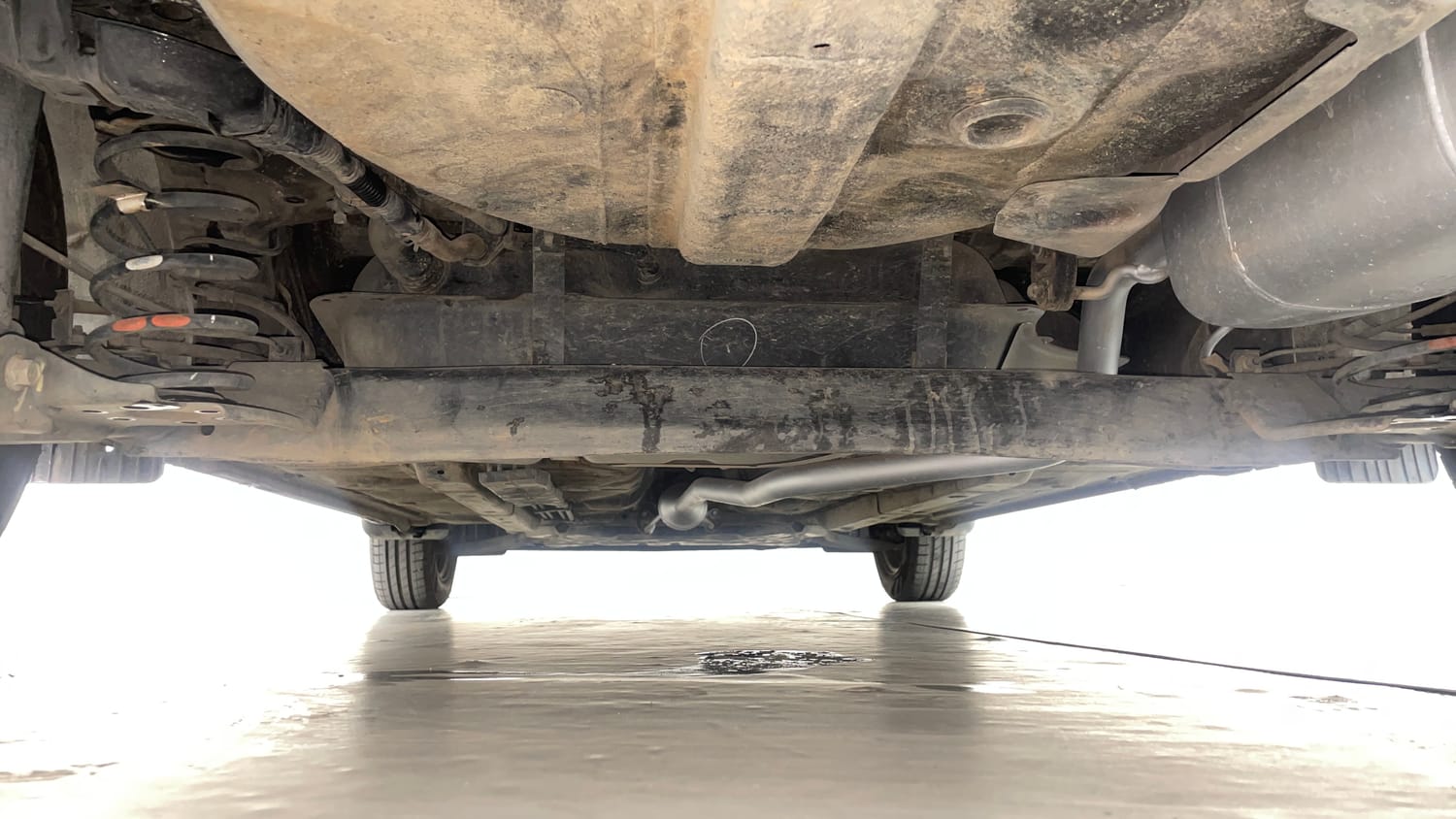 Used 2021 Hyundai Aura S 1.2 Petrol Petrol Manual extra REAR UNDERBODY VIEW (TAKEN FROM REAR)