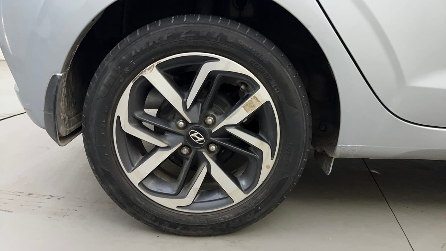 Used 2021 Hyundai Grand i10 Nios Asta 1.2 Kappa VTVT Petrol Manual tyres RIGHT REAR TYRE RIM VIEW