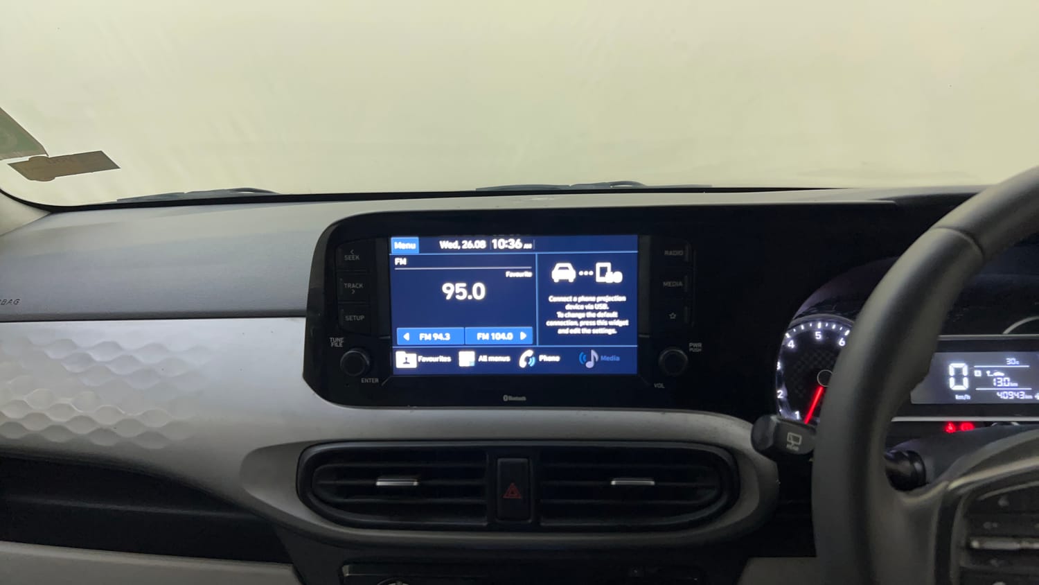 Used 2021 Hyundai Grand i10 Nios Asta 1.2 Kappa VTVT Petrol Manual top_features Integrated (in-dash) music system