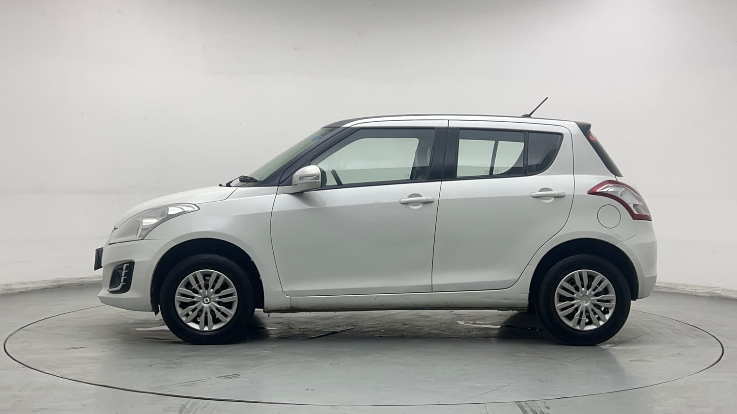 Used 2015 Maruti Suzuki Swift VXi Petrol Manual exterior LEFT SIDE VIEW