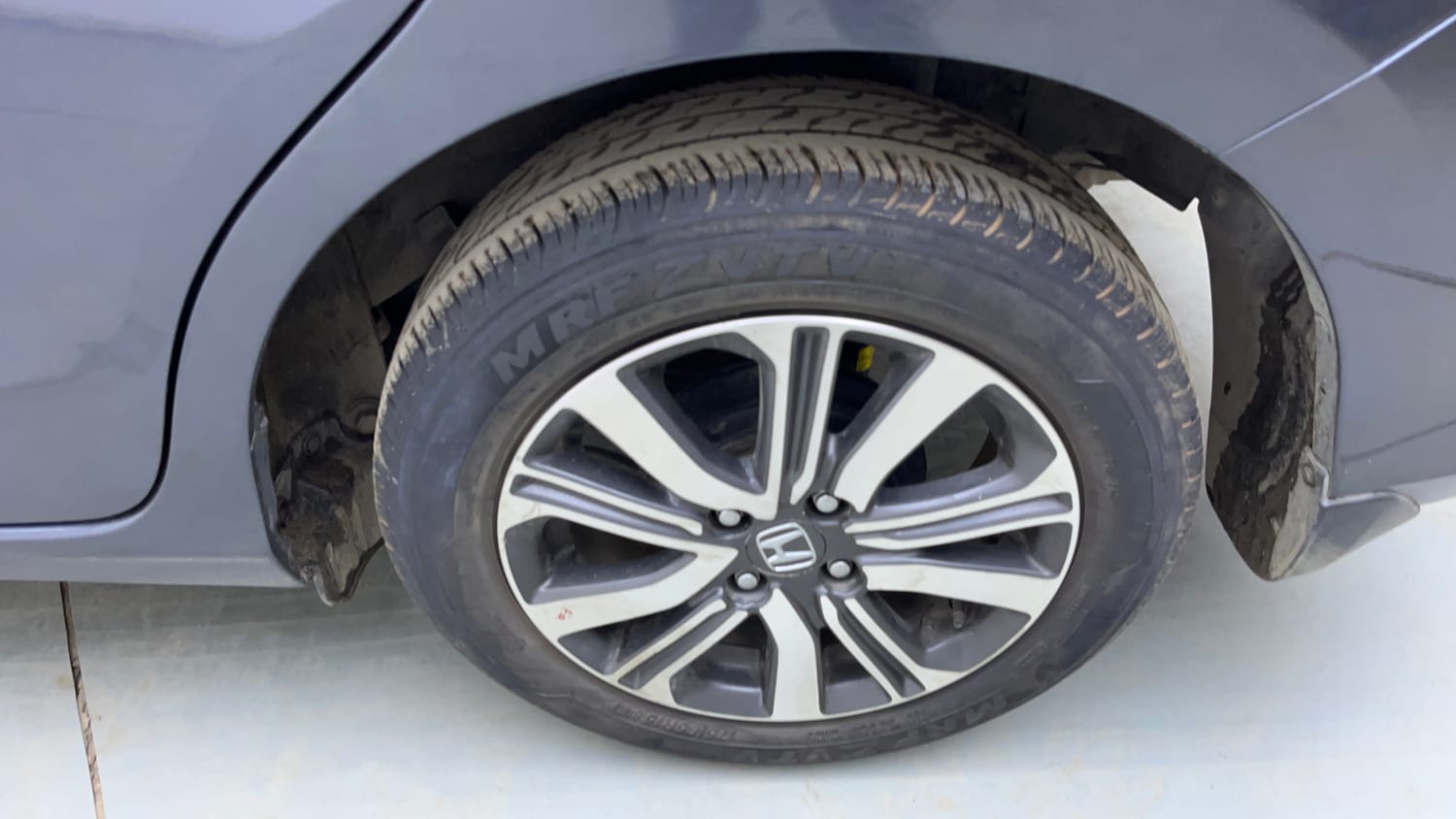 Used 2023 Honda Amaze VX 1.2 Petrol MT Petrol Manual tyres LEFT REAR TYRE RIM VIEW