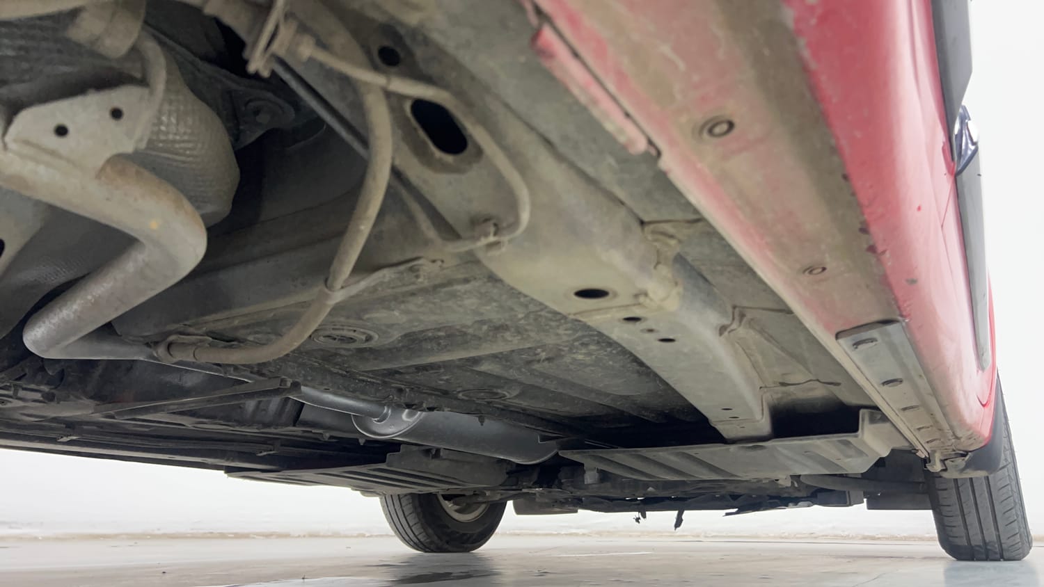 Used 2021 Maruti Suzuki Swift VXi AMT Petrol Automatic extra REAR RIGHT UNDERBODY VIEW