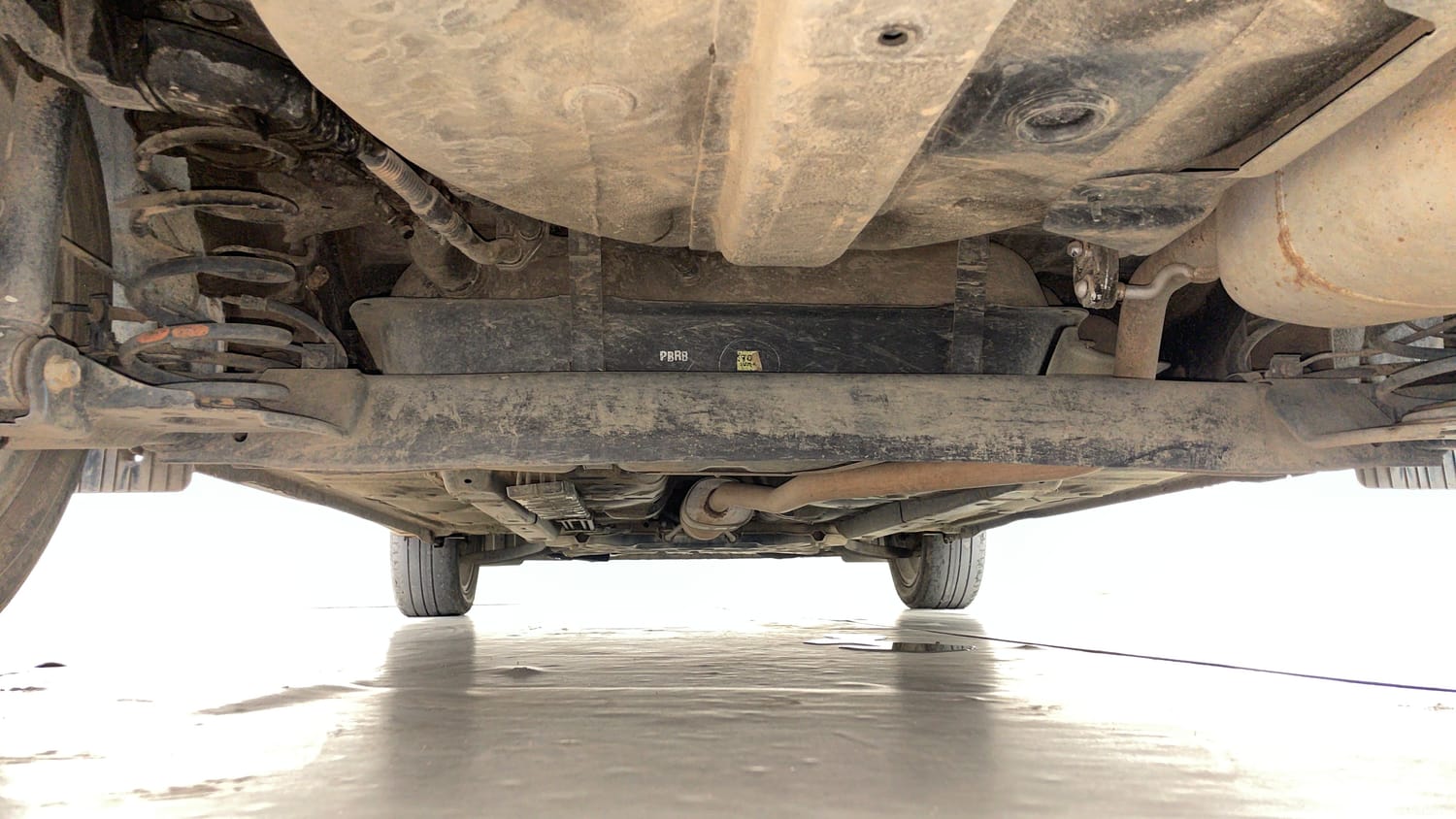Used 2020 Hyundai Aura SX Plus 1.2 AMT Petrol Petrol Automatic extra REAR UNDERBODY VIEW (TAKEN FROM REAR)