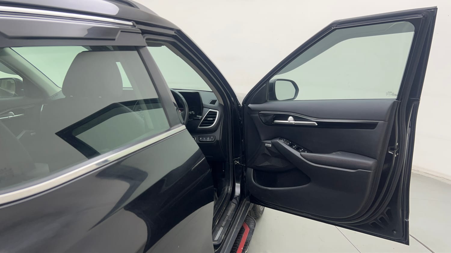 Used 2023 Kia Seltos GTX Plus 1.4 Petrol Manual interior RIGHT FRONT DOOR OPEN VIEW