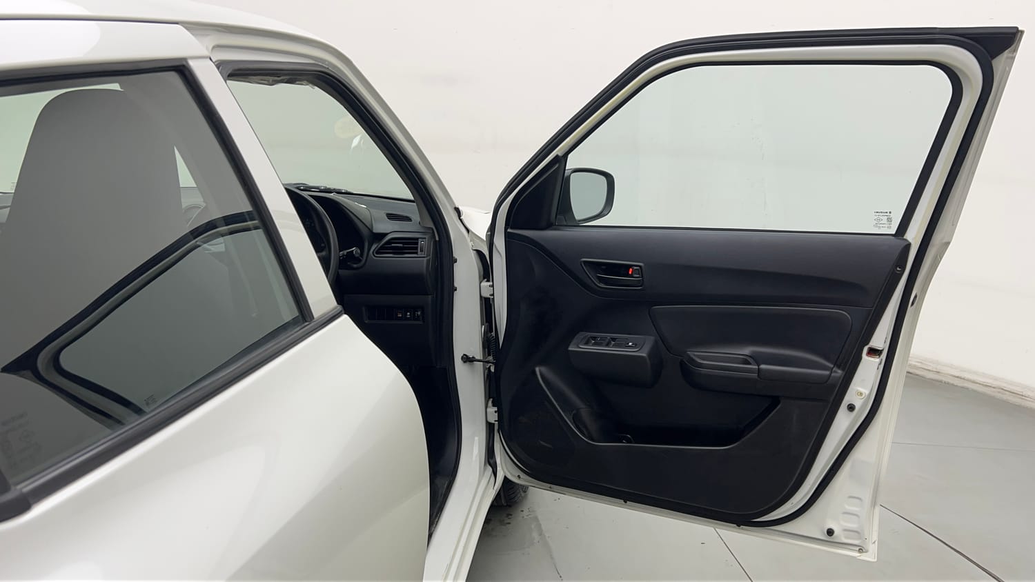 Used 2023 Maruti Suzuki Swift LXi Petrol Manual interior RIGHT FRONT DOOR OPEN VIEW