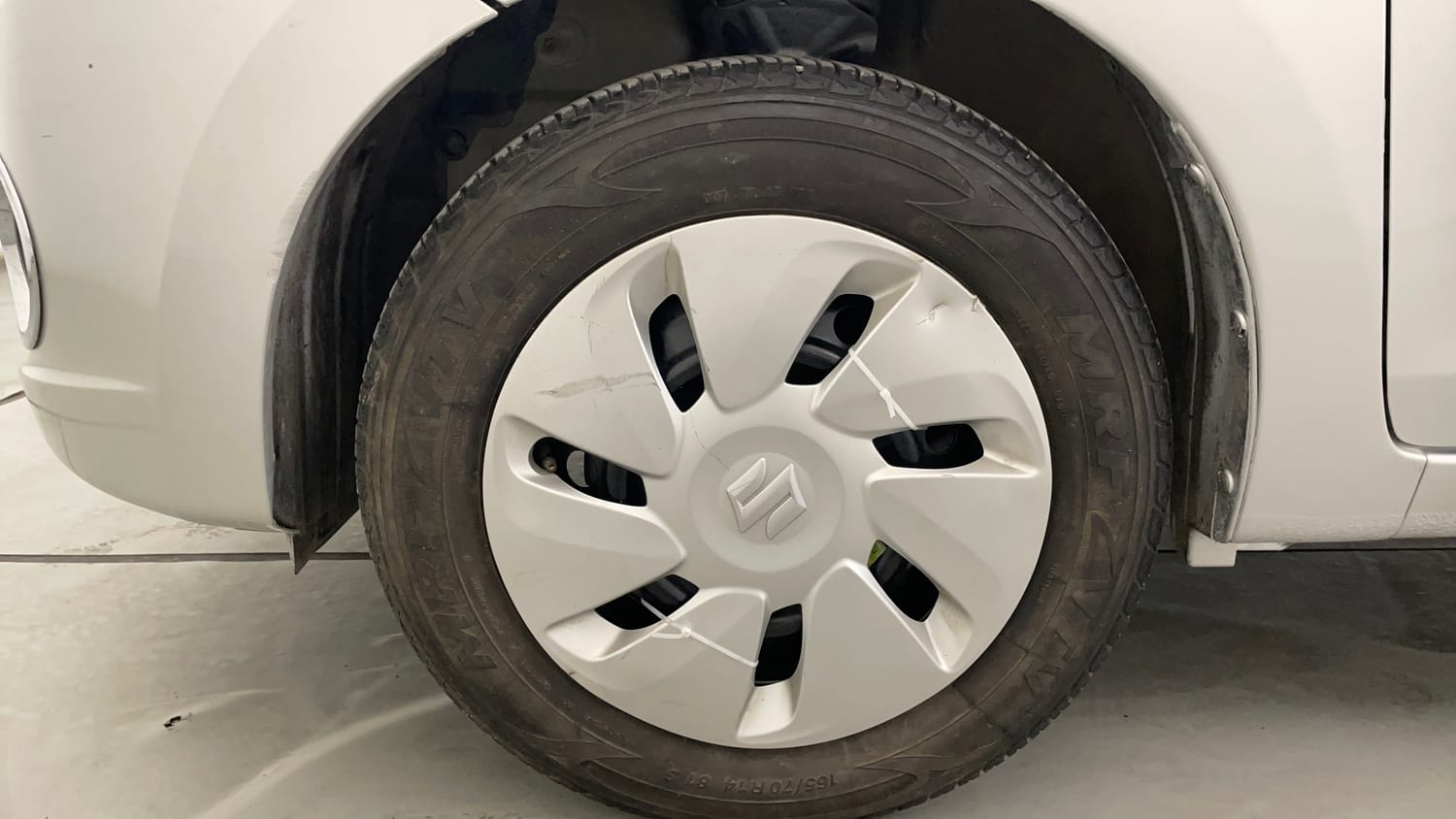 Used 2014 Maruti Suzuki Celerio VXi Petrol Manual tyres LEFT FRONT TYRE RIM VIEW
