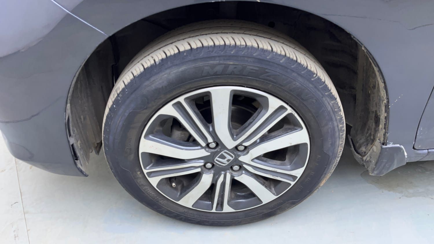 Used 2023 Honda Amaze VX 1.2 Petrol MT Petrol Manual tyres LEFT FRONT TYRE RIM VIEW