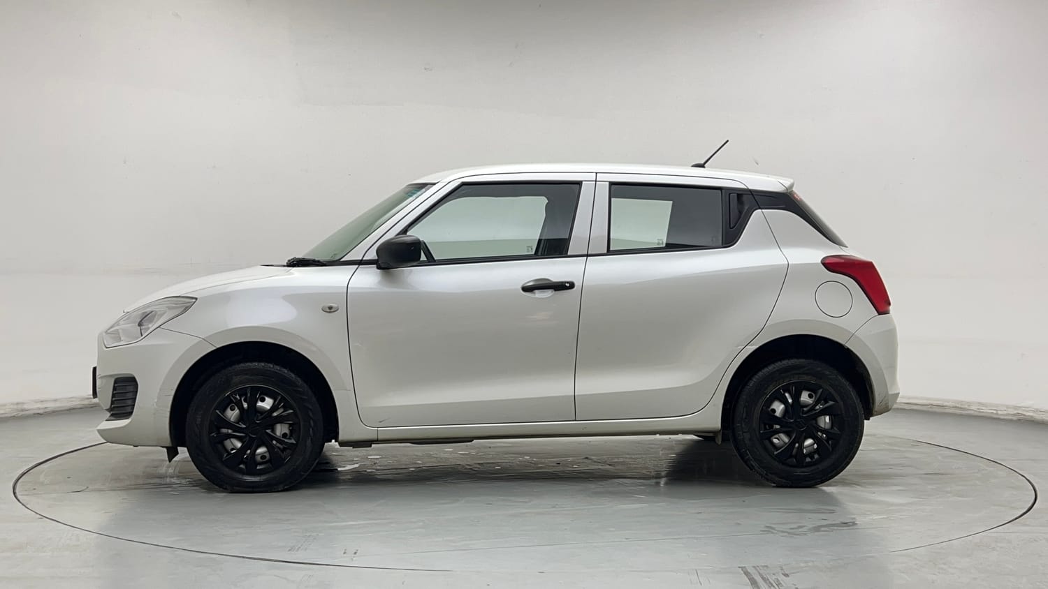 Used 2023 Maruti Suzuki Swift LXi Petrol Manual exterior LEFT SIDE VIEW