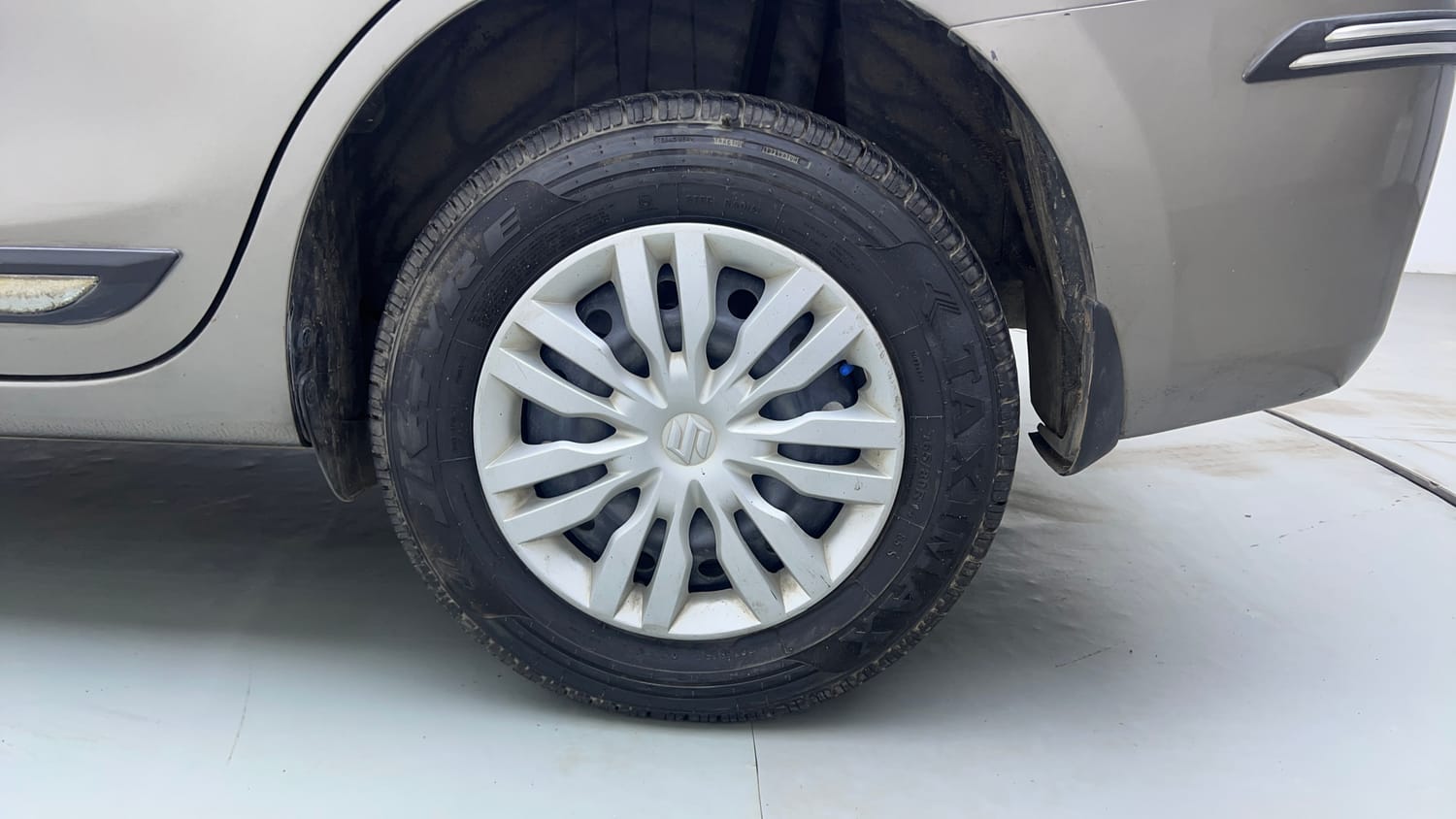 Used 2019 Maruti Suzuki Dzire VXi AMT Petrol Automatic tyres LEFT REAR TYRE RIM VIEW