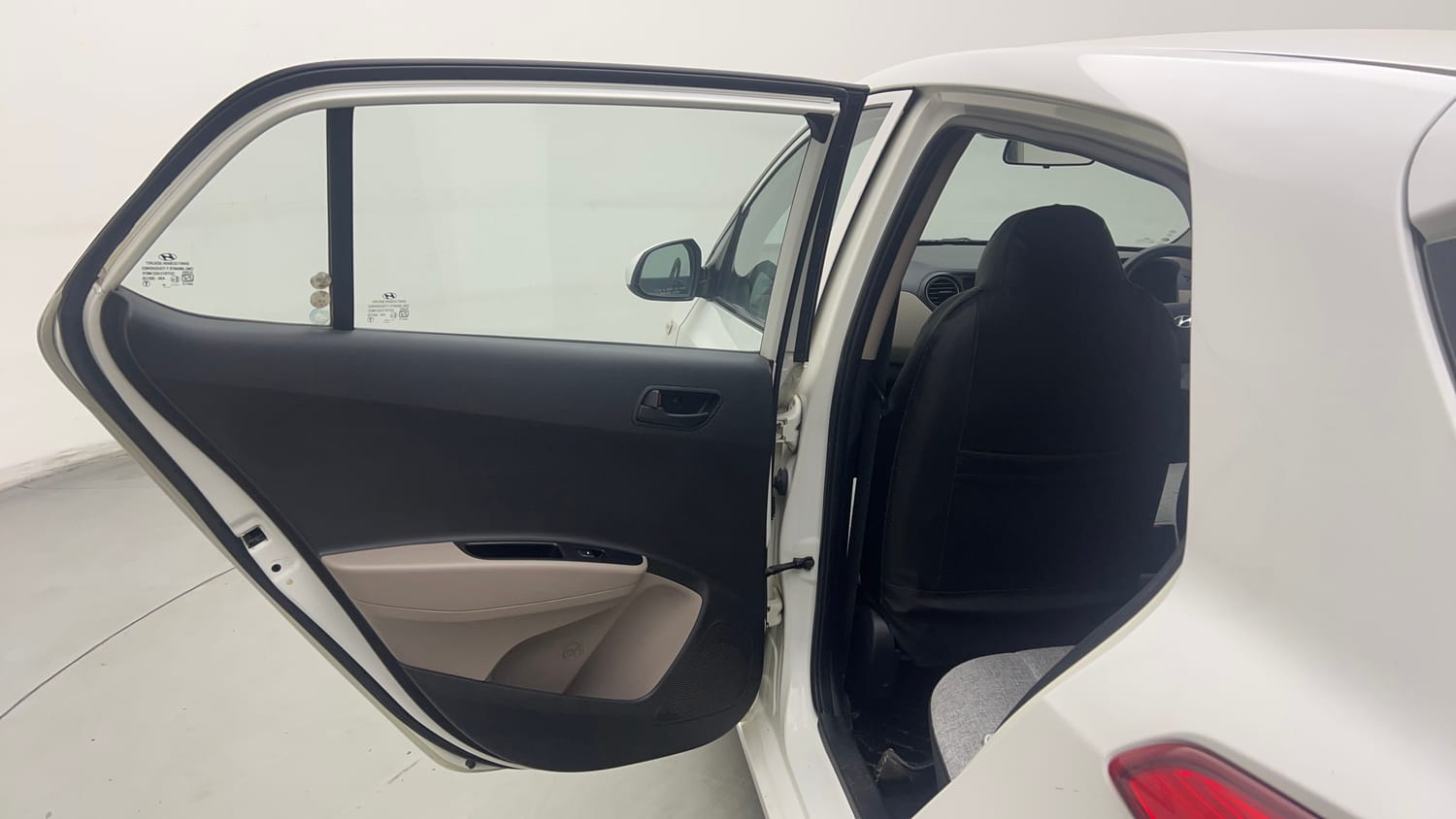Used 2015 Hyundai Grand i10 Magna 1.2 Kappa VTVT Petrol Manual interior LEFT REAR DOOR OPEN VIEW
