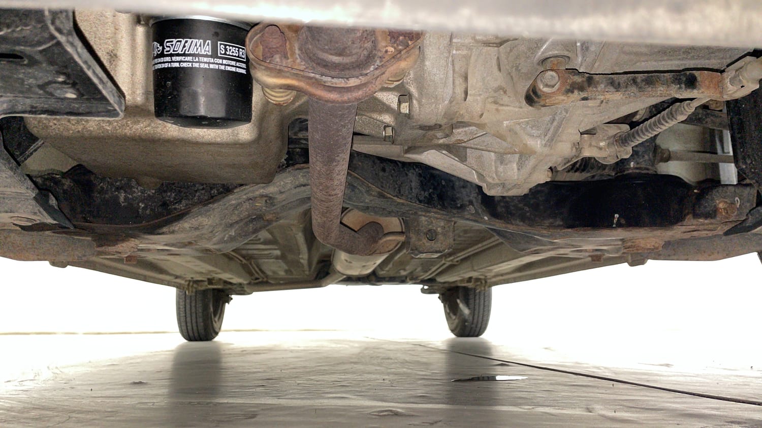 Used 2014 Maruti Suzuki Celerio VXi Petrol Manual extra FRONT LEFT UNDERBODY VIEW