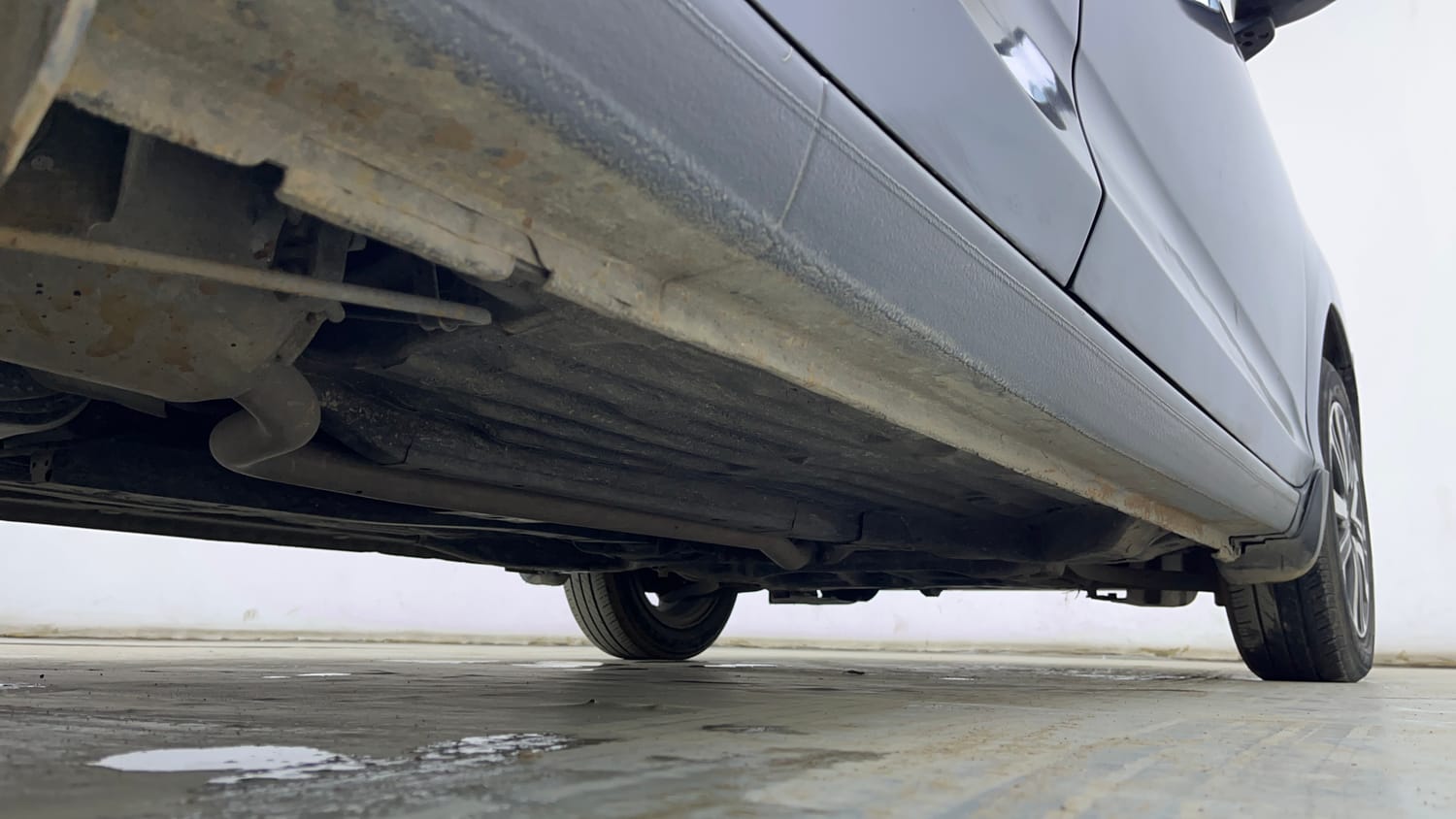 Used 2023 Honda Amaze VX 1.2 Petrol MT Petrol Manual extra REAR RIGHT UNDERBODY VIEW