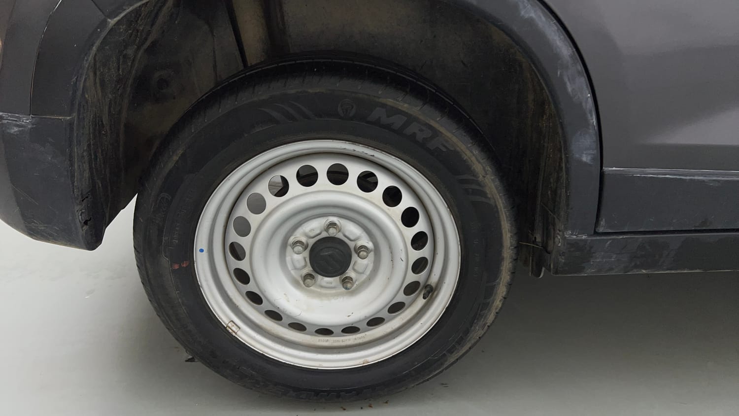 Used 2021 maruti-suzuki Vitara Brezza LXi Petrol Manual tyres RIGHT REAR TYRE RIM VIEW