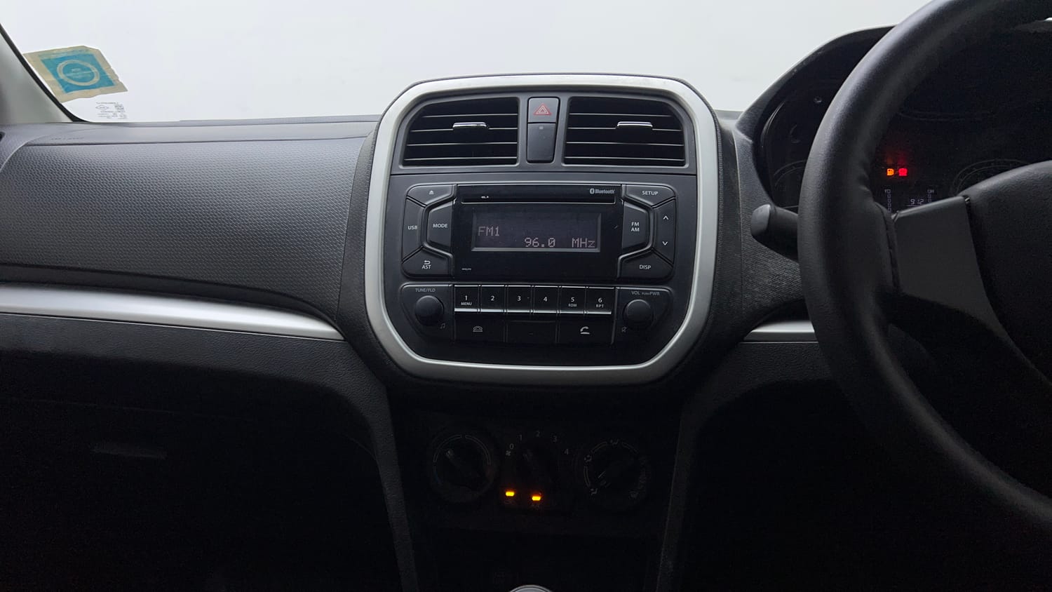 Used 2021 maruti-suzuki Vitara Brezza LXi Petrol Manual interior MUSIC SYSTEM & AC CONTROL VIEW