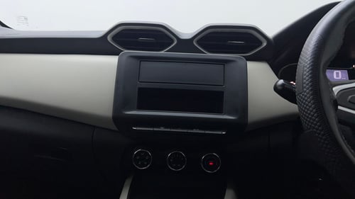 Used 2023 Nissan Magnite XE Petrol Manual interior MUSIC SYSTEM & AC CONTROL VIEW