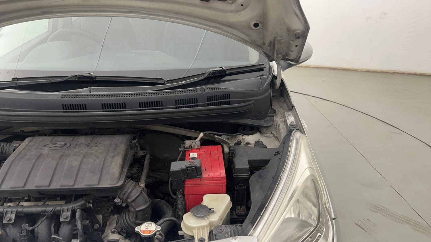Used 2017 Hyundai Grand i10 Magna 1.2 Kappa VTVT Petrol Manual engine ENGINE LEFT SIDE HINGE & APRON VIEW