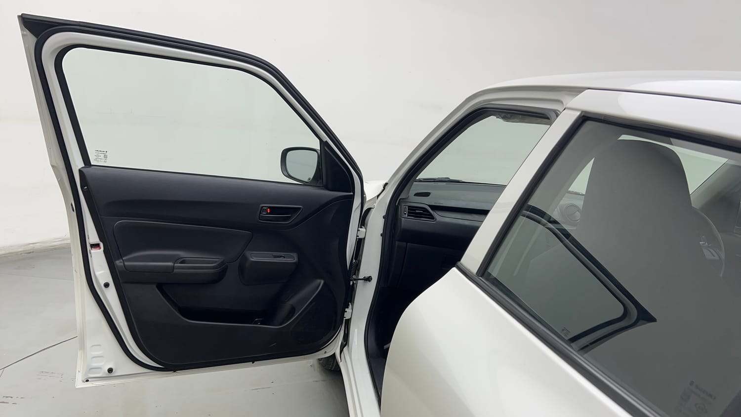 Used 2023 Maruti Suzuki Swift LXi Petrol Manual interior LEFT FRONT DOOR OPEN VIEW