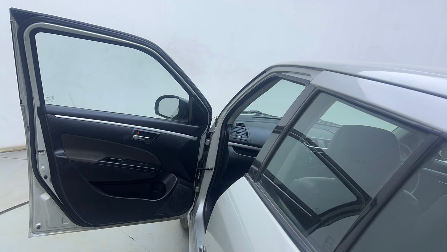 Used 2015 Maruti Suzuki Swift VXi Petrol Manual interior LEFT FRONT DOOR OPEN VIEW