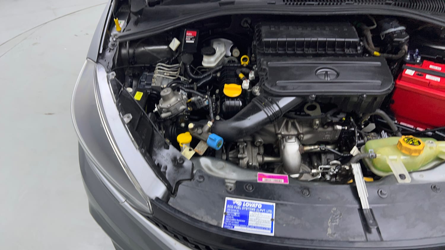 Used 2021 Tata Tiago LE Petro l+ CNG(Outside Fitted) Cng Manual engine ENGINE RIGHT SIDE VIEW