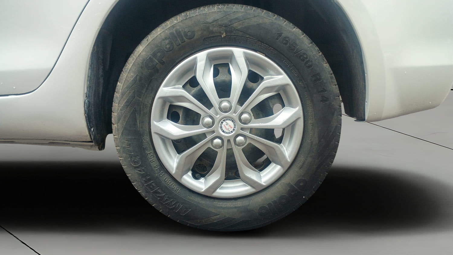 Used 2015 Maruti Suzuki Swift Dzire VXI Petrol Manual tyres LEFT REAR TYRE RIM VIEW