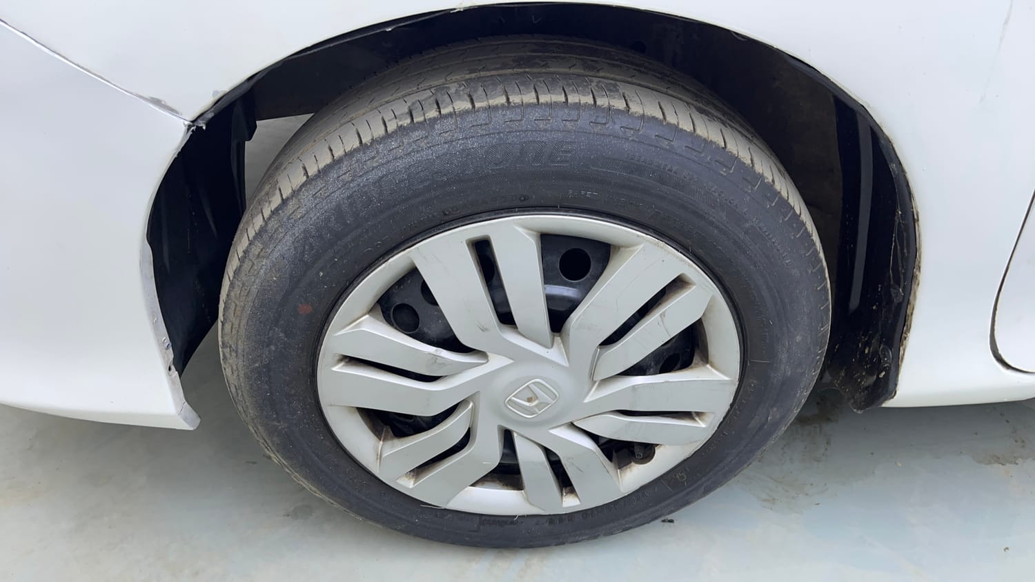 Used 2014 Honda City SV Petrol Manual tyres LEFT FRONT TYRE RIM VIEW