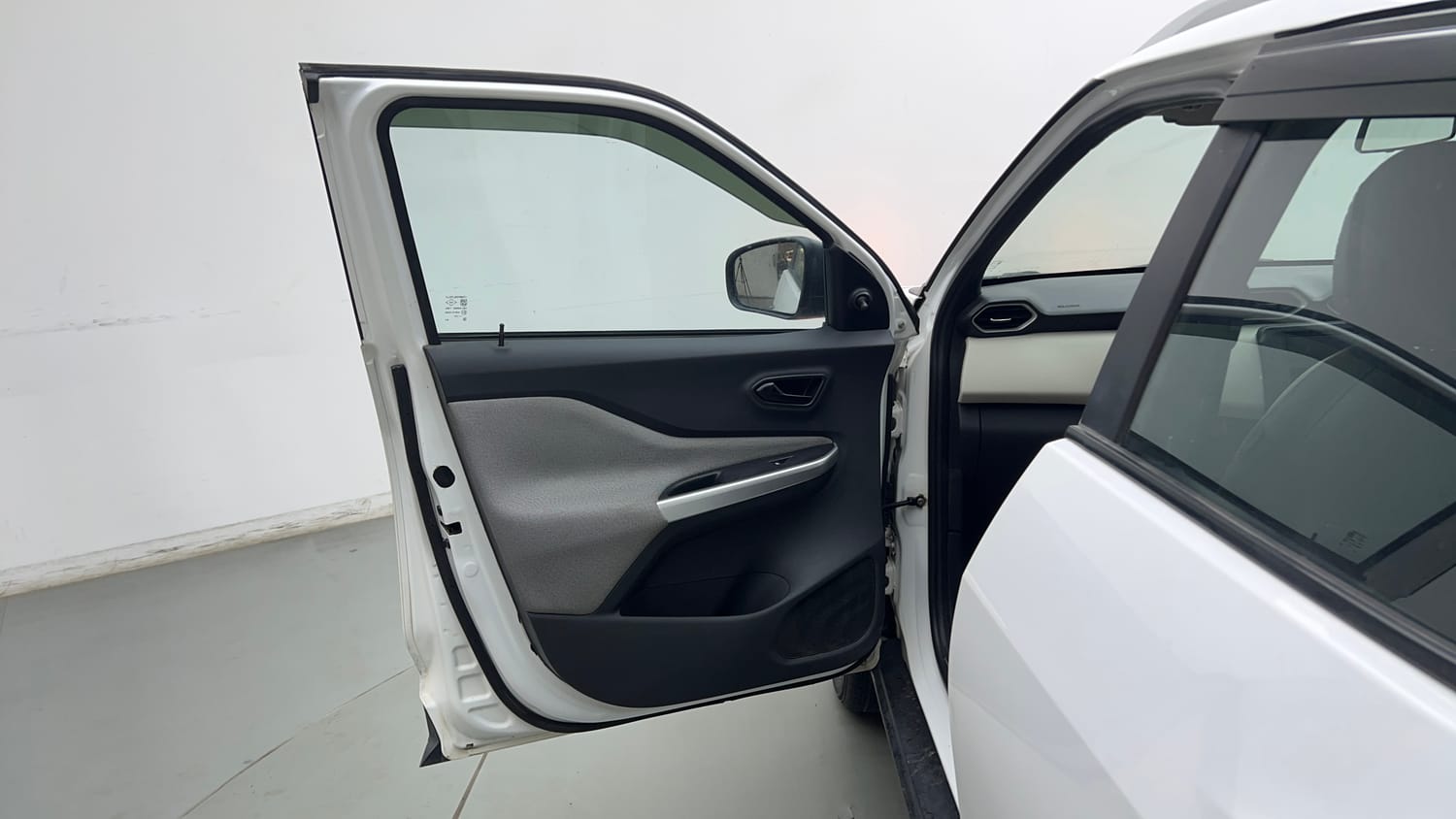 Used 2023 Nissan Magnite XE Petrol Manual interior LEFT FRONT DOOR OPEN VIEW
