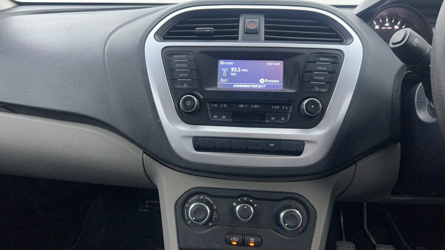 Used 2017 Tata Tiago Revotron XT Petrol Manual interior MUSIC SYSTEM & AC CONTROL VIEW