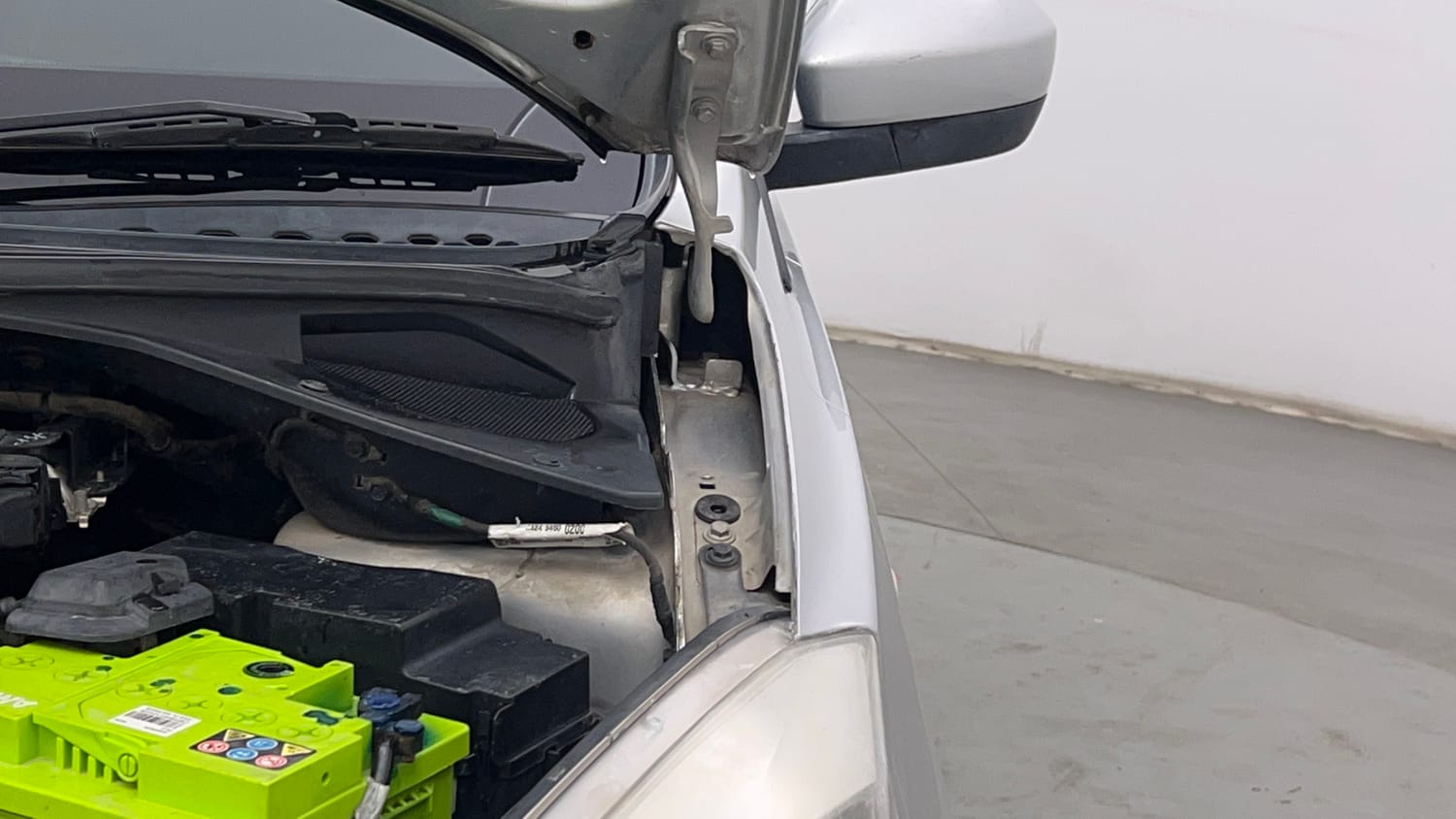 Used 2017 Tata Tiago Revotron XT Petrol Manual engine ENGINE LEFT SIDE HINGE & APRON VIEW