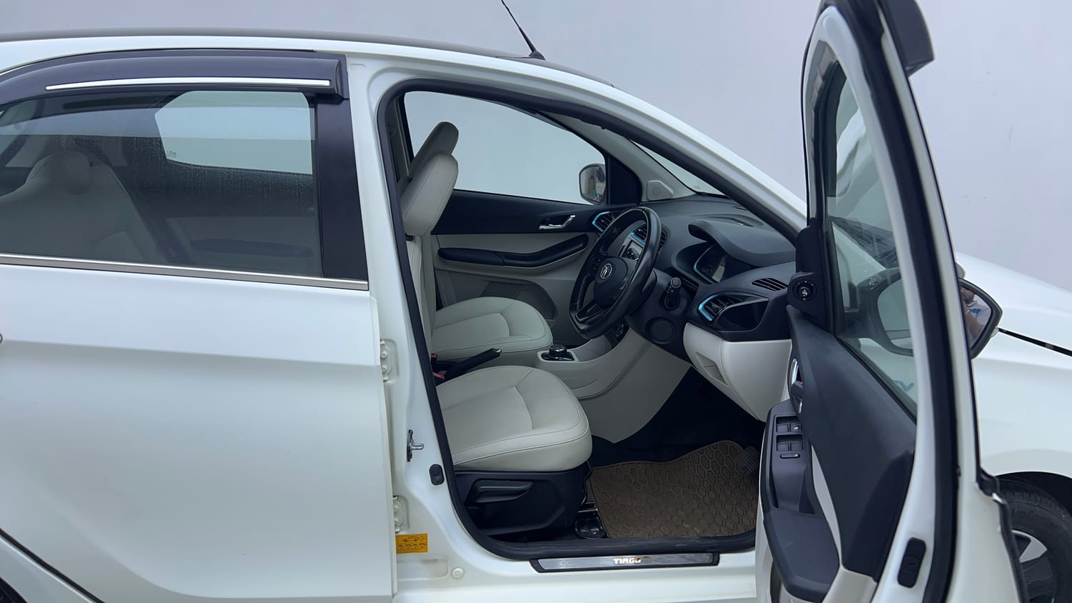 Used 2023 Tata Tiago EV XZ Plus Tech LUX Long Range Electric Automatic interior RIGHT SIDE FRONT DOOR CABIN VIEW