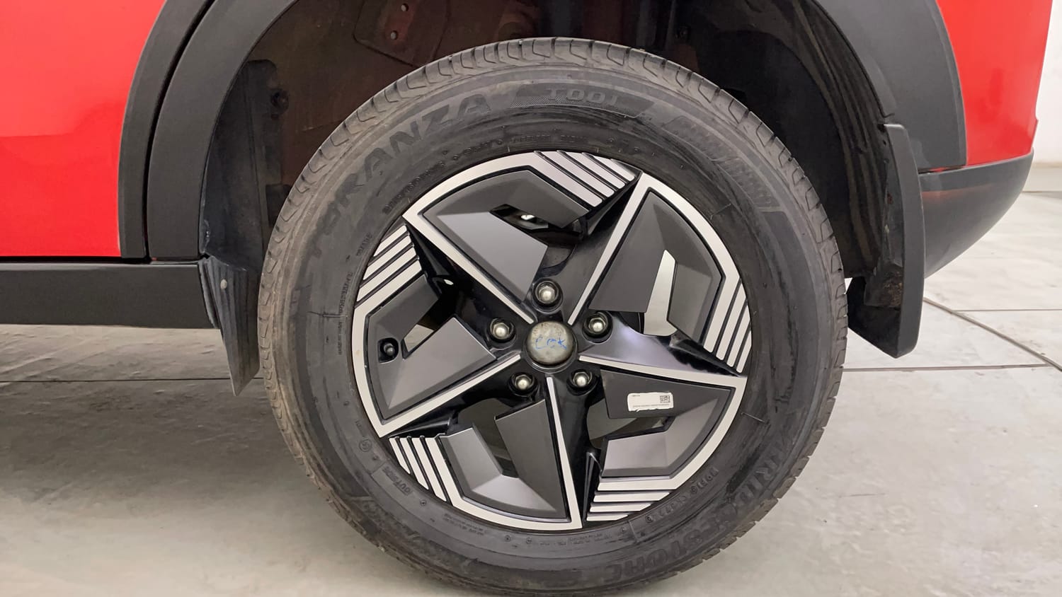 Used 2024 Tata Nexon Creative Plus S 1.2 Revotron Petrol 6AMT Petrol Automatic tyres LEFT REAR TYRE RIM VIEW
