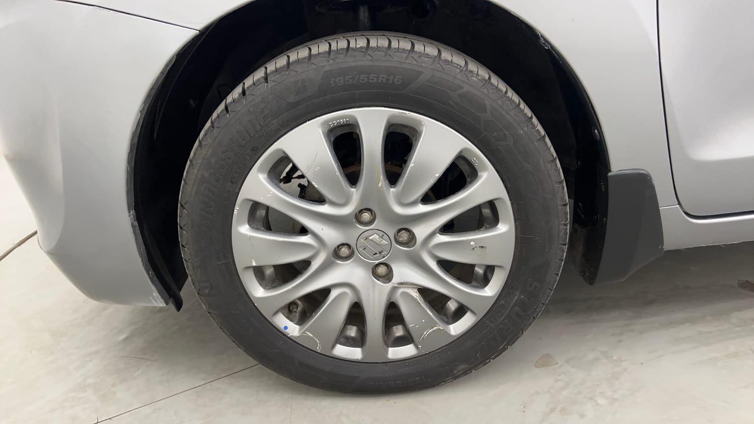 Used 2017 Maruti Suzuki Baleno Alpha 1.2 Petrol Manual tyres LEFT FRONT TYRE RIM VIEW