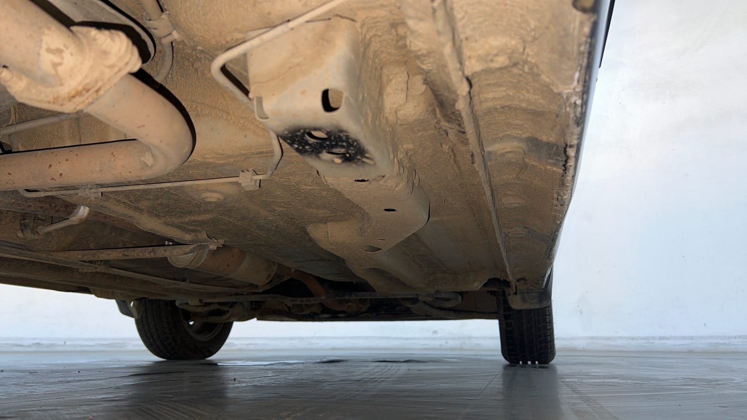 Used 2021 Tata Tiago LE Petro l+ CNG(Outside Fitted) Cng Manual extra REAR RIGHT UNDERBODY VIEW