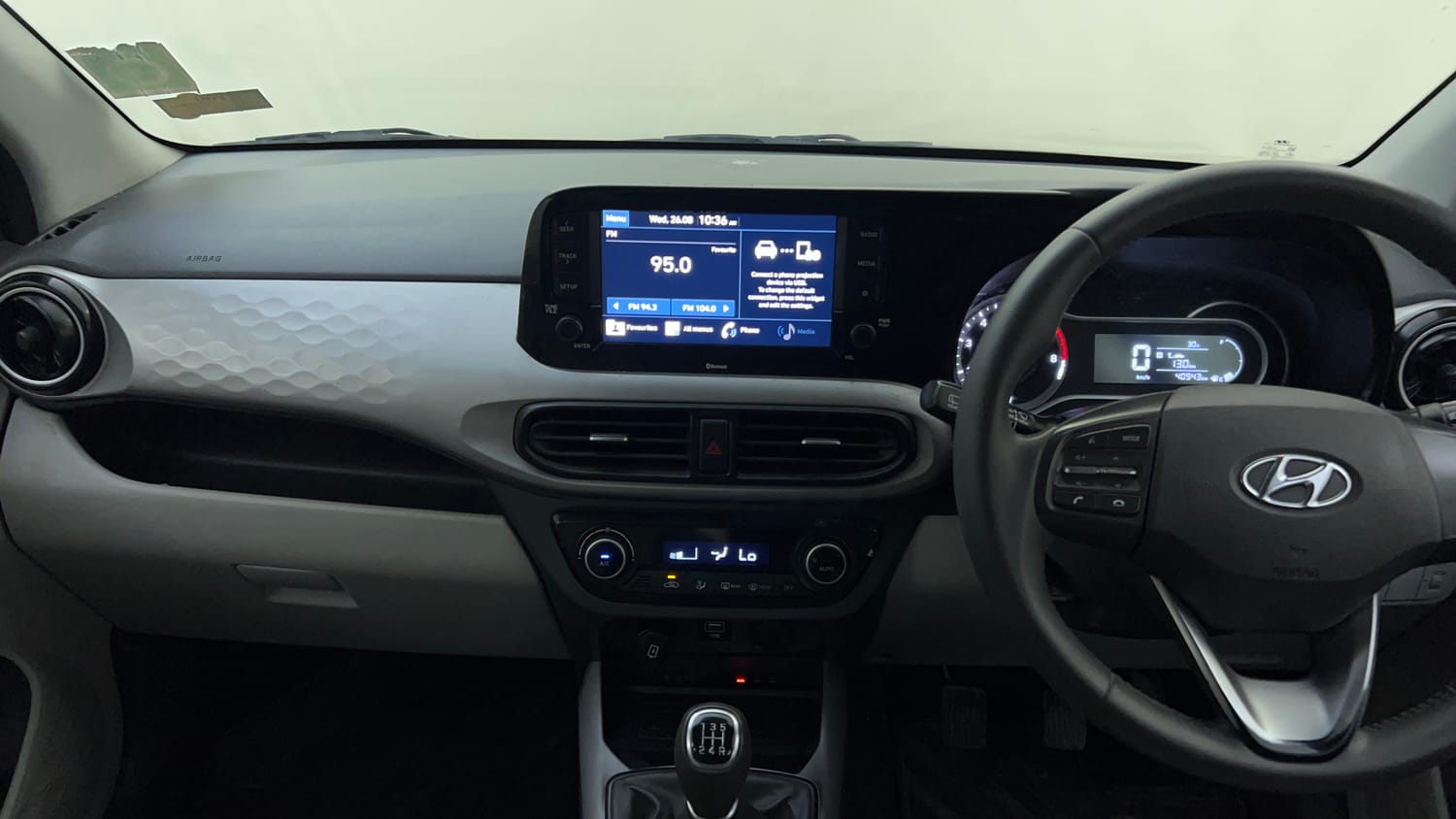 Used 2021 Hyundai Grand i10 Nios Asta 1.2 Kappa VTVT Petrol Manual interior MUSIC SYSTEM & AC CONTROL VIEW