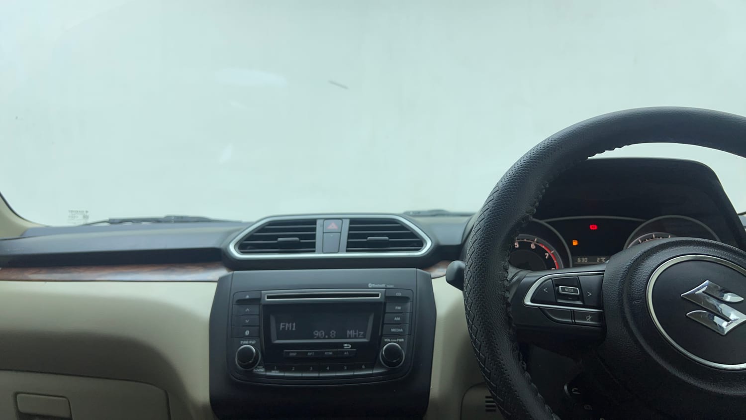 Used 2019 Maruti Suzuki Dzire VXi AMT Petrol Automatic top_features Integrated (in-dash) music system