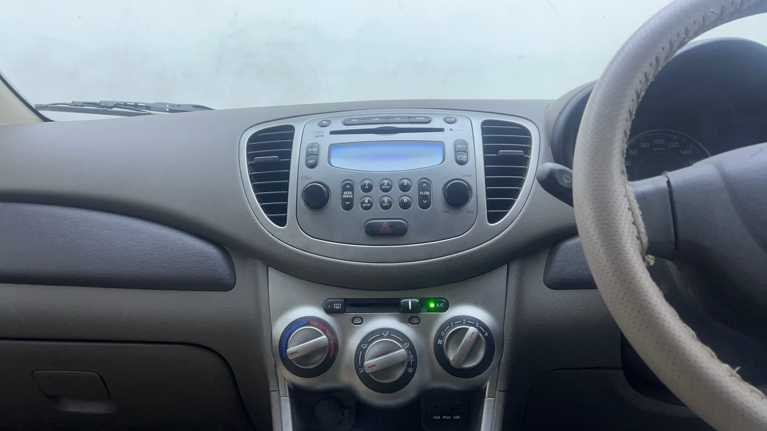 Used 2013 Hyundai i10 Sportz 1.2 Kappa2 Petrol Manual interior MUSIC SYSTEM & AC CONTROL VIEW