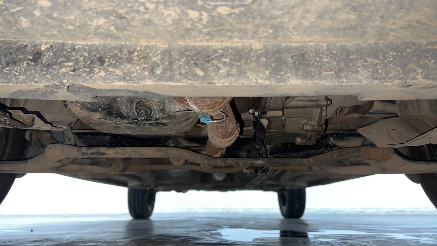 Used 2021 Tata Tiago LE Petro l+ CNG(Outside Fitted) Cng Manual extra FRONT LEFT UNDERBODY VIEW