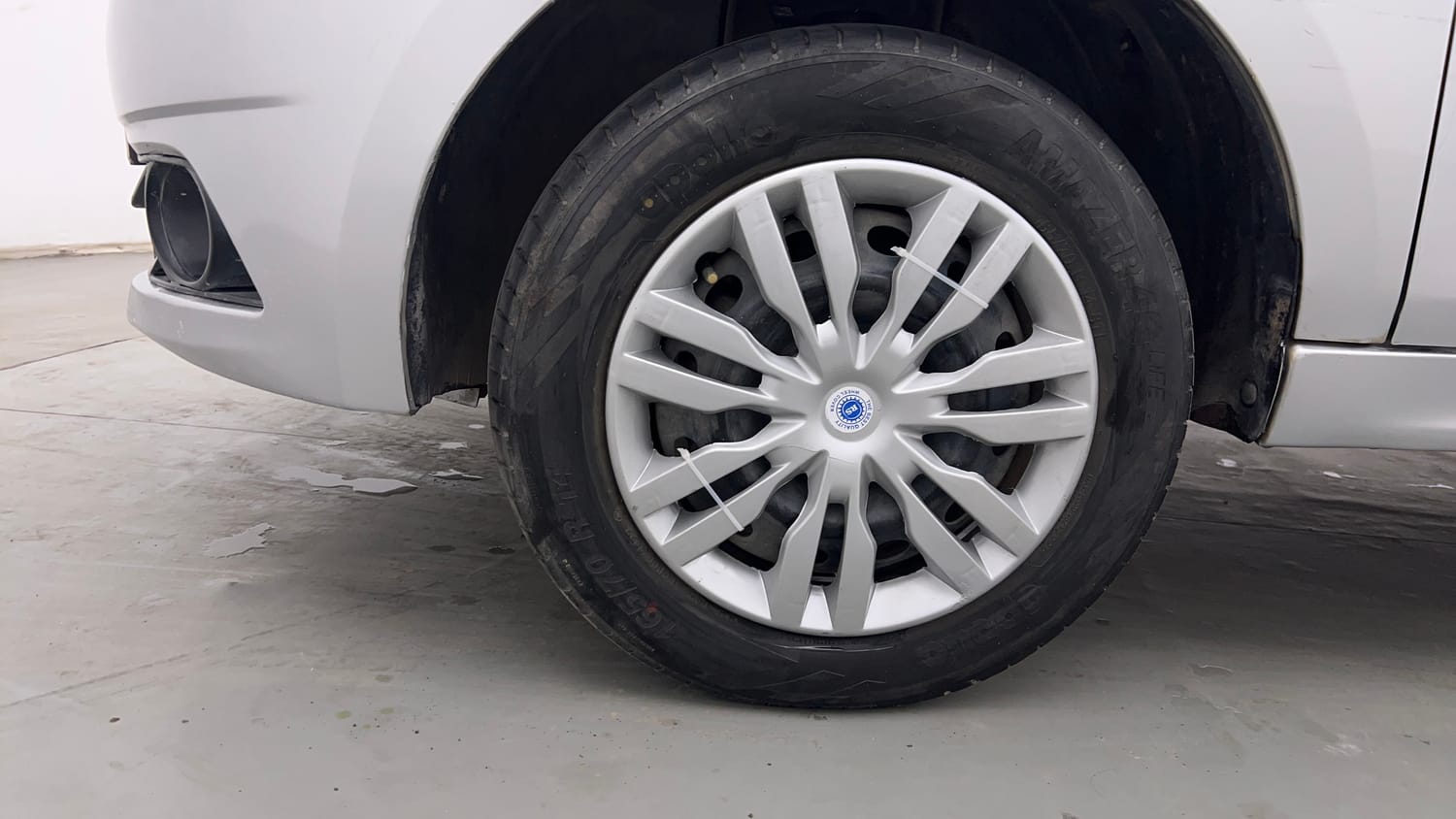 Used 2017 Tata Tiago Revotron XT Petrol Manual tyres LEFT FRONT TYRE RIM VIEW