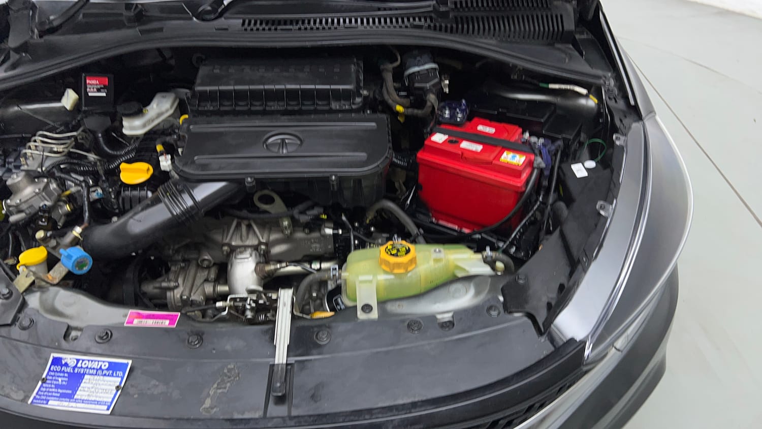 Used 2021 Tata Tiago LE Petro l+ CNG(Outside Fitted) Cng Manual engine ENGINE LEFT SIDE VIEW