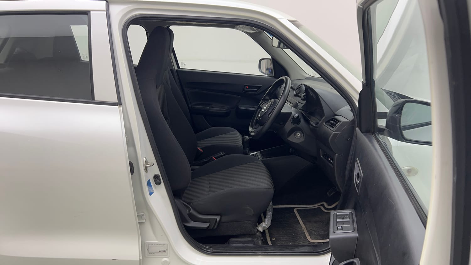 Used 2023 Maruti Suzuki Swift LXi Petrol Manual interior RIGHT SIDE FRONT DOOR CABIN VIEW
