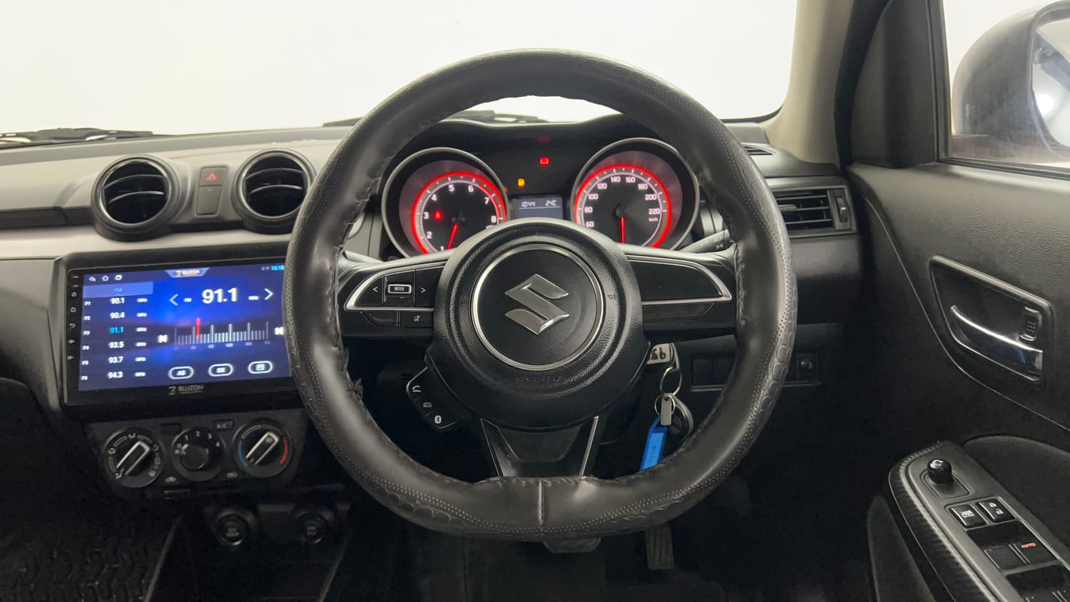 Used 2021 Maruti Suzuki Swift VXi AMT Petrol Automatic interior STEERING VIEW