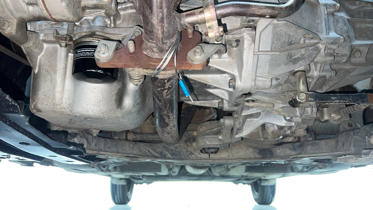 Used 2023 Maruti Suzuki Swift LXi Petrol Manual extra FRONT LEFT UNDERBODY VIEW