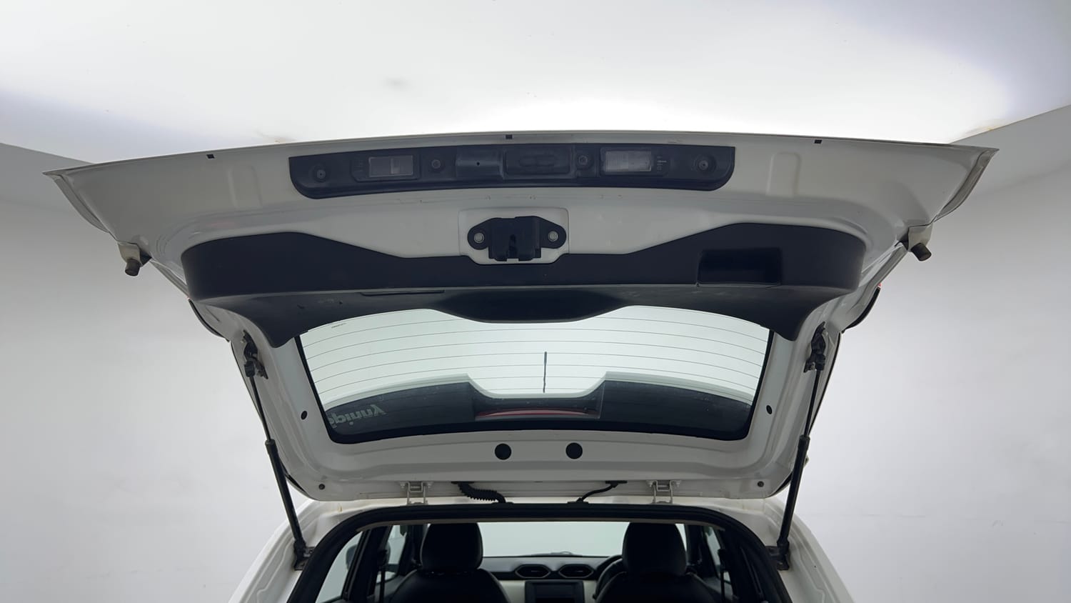 Used 2023 Nissan Magnite XE Petrol Manual interior DICKY DOOR OPEN VIEW