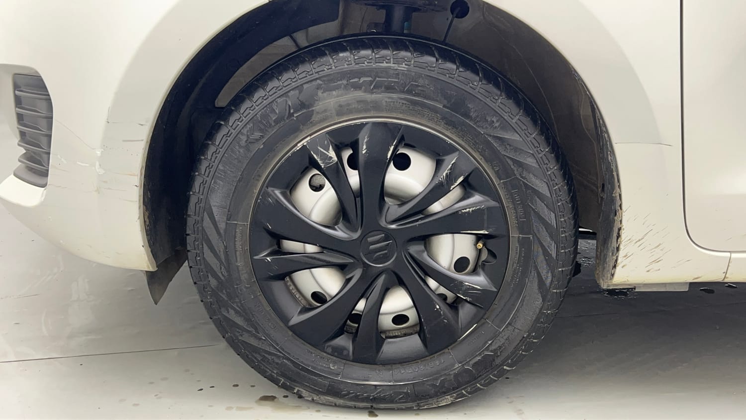 Used 2023 Maruti Suzuki Swift LXi Petrol Manual tyres LEFT FRONT TYRE RIM VIEW