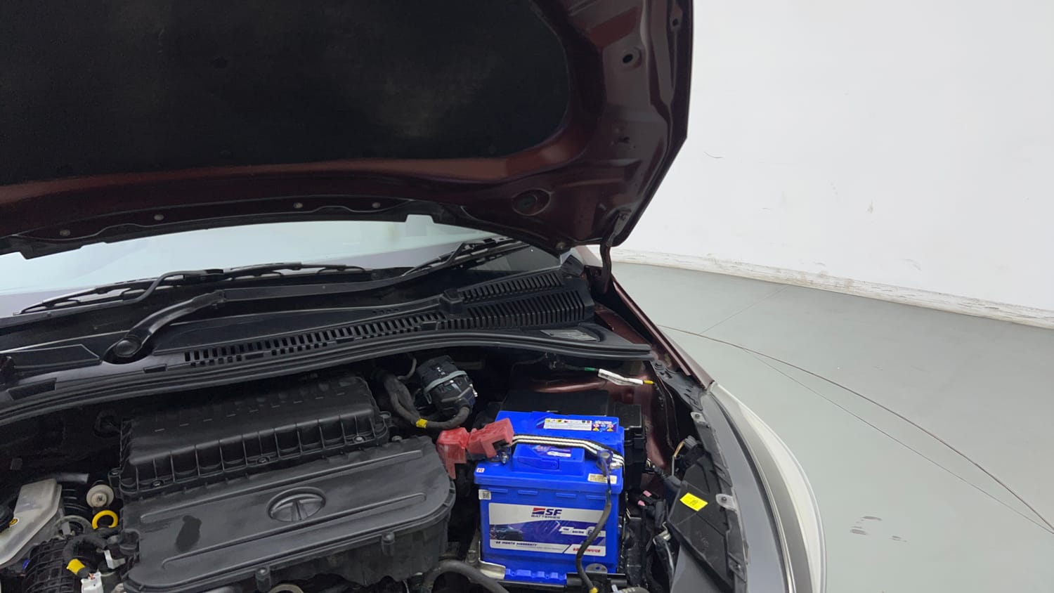 Used 2023 Tata Tigor XZ Plus CNG Leatherette Pack Cng Manual engine ENGINE LEFT SIDE HINGE & APRON VIEW
