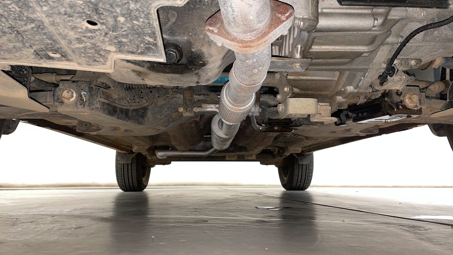 Used 2024 Tata Nexon Creative Plus S 1.2 Revotron Petrol 6AMT Petrol Automatic extra FRONT LEFT UNDERBODY VIEW