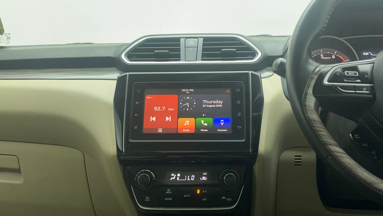 Used 2021 Maruti Suzuki Dzire ZXi Plus AGS Petrol Automatic top_features Integrated (in-dash) music system